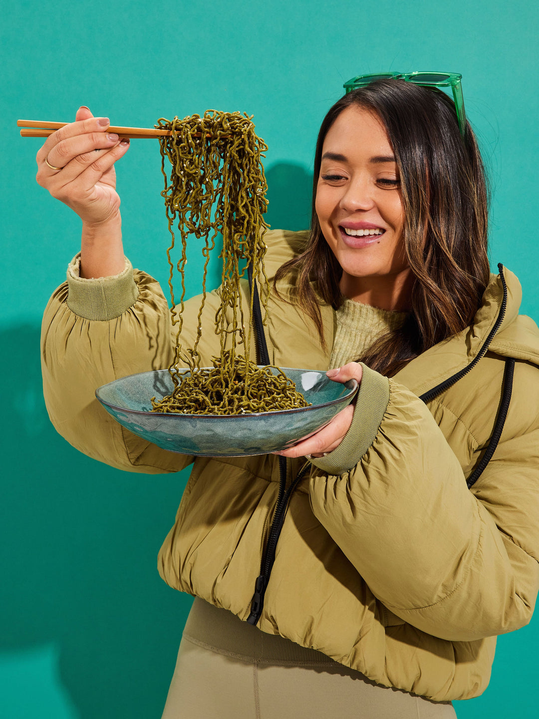 woman enjoying moringa noodles