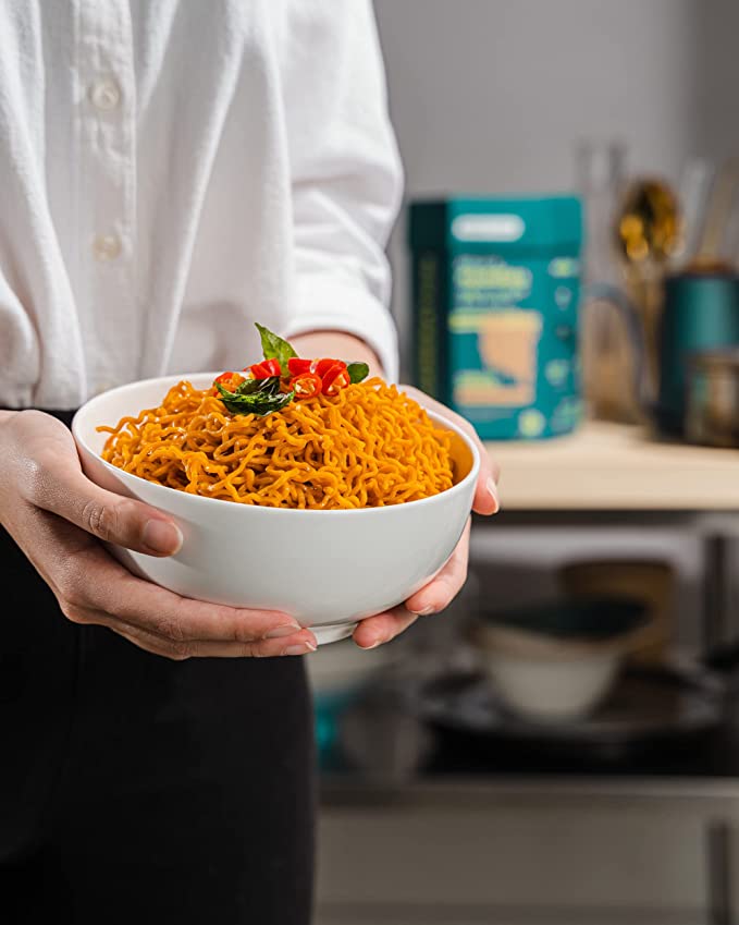 bowl full of pumpkin noods with cheeky curry seasoning